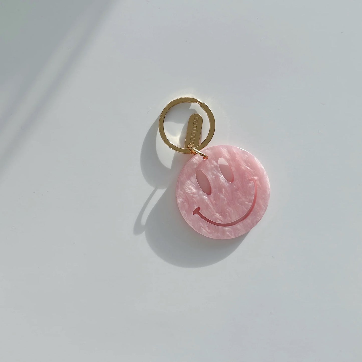Rosa Happy Face Schlüsselanhänger